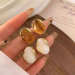 French Amber Women's Irregular Oval Resin Light and High End Mellard Style Earrings