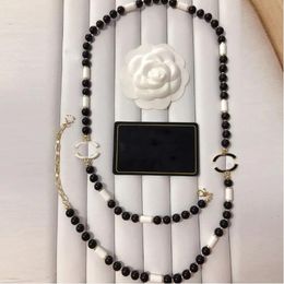 20style Luxury Fashion Brand Designer Pendenti Collane di canale bianco e nero Perla di cristallo Lettera C Collana girocollo Collana con catena maglione Accessori per gioielli