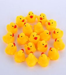 Whole 100pcs Baby toy Bath Water Duck Mini Floating Yellow Rubber Ducks with Sound Children Shower Swimming Beach Play Toys Se4182170