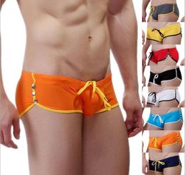 WholeSummer Fashion Brand Men Sexy Bulging Pouch Rivets Mini Boxers SwimwearGay Gym Swim TrunksBeach Board Shorts3447726