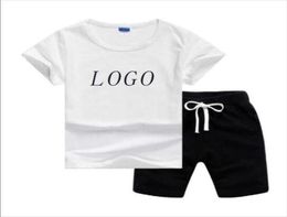 Logo Summer Designers clothes Kids Clothing Sets shortsleeved Tshirt shorts round neck twopiece sportswear for boys and girls2591367