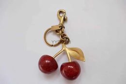 Keychains cherry red Chapstick Wrap Lipstick Cover Team Lipbalm Cozy/bag parts mode fashion 240303