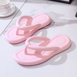 yyds The new female summer fashion outside wear non-slip net red beach eva solid color flat bottom step on shit sense foot flip flops 2024