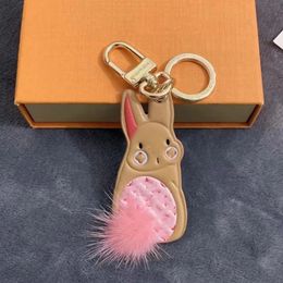 2023 New designer keychain rabbit and panda plush cute ladies' bag pendant men's car key high-grade creative pendant 012297