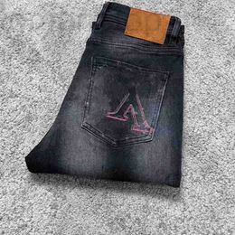 Jeans da uomo Designer moda uomo jeans Alfabeto ricamato Cartoon Kitten Uomo Coreano piedi slim fit Pantaloni europei elasticizzati ZZWY FRIB
