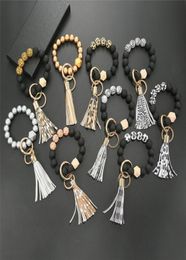 2021 Print wooden Beads Bracelet Keychain for Girls Jewellery with Tassels Gifts Trendy Simple Wave Style Circle Wristlet Keychains 3559637