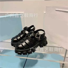 Sports 2024 P family soled Roman sandals for summer new hollow thick heel button womens with triangle sponge cake shoes