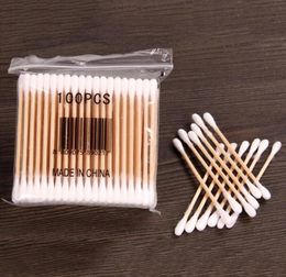 Whole 100pcs Women Beauty Makeup Cotton Swab Double Head Cotton Buds Make Up Wood Sticks Nose Ears Cleaning Cosmetics Health 1100254