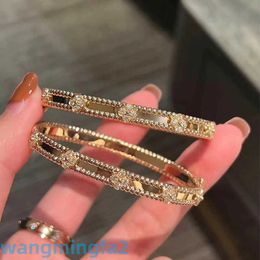 2024jewelry Designer Vans Four-leaf Clover Bracelet Cnc Narrow Kaleidoscope Plated with 18k Rose Gold Fashionable Niche Full Diamond Clover Bracelet