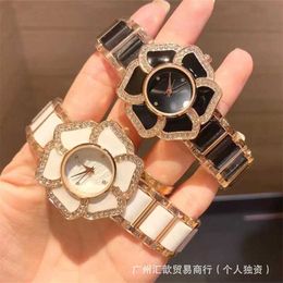 40% OFF watch Watch Xiangjia Fashion Flower Shaped Diamond Disc Quartz Steel Band Womens