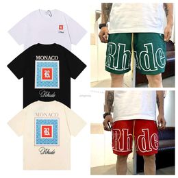 Designer T Shirts Mens Shorts Women Man Clothing Graphic Tees Pattern Tops Summer Short Sleeve Tshirt Hip Hop Letters Graffiti Print Loose Shirts Rhude Causal 725