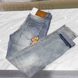 Jeans da uomo Designer jeans da uomo Alfabeto ricamato Cartoon Kitten jean Coreano slim-fit piede elastico moda pantaloni europei NEBD 846X