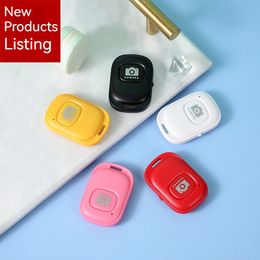 Mobile phone small mini selfie Bluetooth remote control novel flip button Tiktok click like control remote wireless camera for Apple Android Huawei Xiaomi