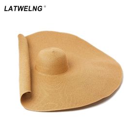 Super Bigger Brim Wide Straw Hats For Women Foldable Paper Beach Hat Summer Sun UV Hats Stage Cap Drop Whole Y2007163261