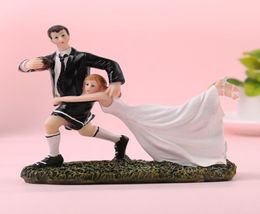 FEIS west style bride and groom play rugby resign cake topper marriage room decoration wedding gifts9993512