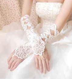 New High Quality White Ivory Fingerless Wedding Gloves Cheap Sheer Lace Beaded Bridal Gloves4519439