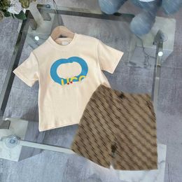 Brand kids tracksuits Short sleeve baby T-shirt set Size 100-150 CM Summer two-piece set boys t shirt and Grid logo full print shorts 24Mar