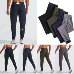 2024 LU womens LL Mens Jogger Long Pants Sport Yoga Outfit Quick Dry Drawstring Gym Pockets Sweatpants Trousers Casual Elastic Waist fitness Lululemens 1006ess