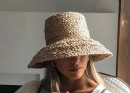 Wide Brim Hats Bucket Hats 01904-HH7330 Handmade Lafite Woven Hepburn Lamp shaped Womens Flat Bucket Hat Outdoor Womens Holiday Beach Hat J240305