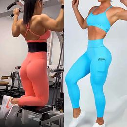 Women's Tracksuits 2024 Spandex Pad Womens Yoga Set High Waist Pocket Fitness Curve Scrench Booty Squat Waterproof Sports Tight Womens Active Set J240305