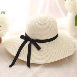 Wide Brim Hats Bucket Hats 2022 New Simple Folding Wide Brim Cork Girl Straw Hat Sun Hat Beach Womens Summer Hat UV Protection Travel Hat Womens Hat J240305