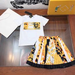 Brand girls dress sets summer Two piece suits child tracksuits Size 90-160 CM Embroidered letters T-shirt and Golden pattern Pleated skirt 24Mar