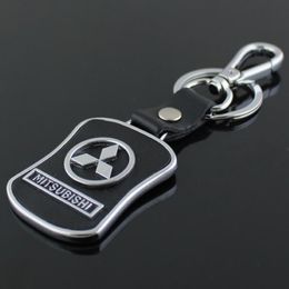 5pcs lot Top Fashion Car Logo keychain For Mitsubishi Metal Leather Keyring Key Chain ring Llaveros Chaveiro Car Emblem key holder2496