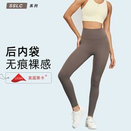 Others Apparel Lycra New Traceless Yoga Pants Womens Outdoor Running Sports Tights Medium Strength Pocket Fitness Pants