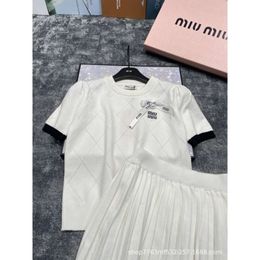 24 early spring new diamond grid short sleeved pullover top Half skirt two-piece set for fashionable casual and sweet style774