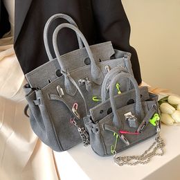 Internet celebrity handbags Female 2022 new niche designer commuter handbag Western denim shoulder crossbody bag