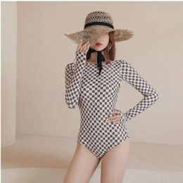 2020 New Xiannv Fan Conjoined Hot Spring Women's Belly Covering Slimming Conservative Long Sleeved Sexy Backless Swimsuit