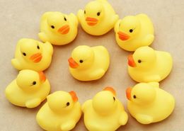 20pcslot 4x4cm Cute Baby Girl Boy Bath Bathing Classic Toys Rubber Race Squeaky Ducks Yellow5948479