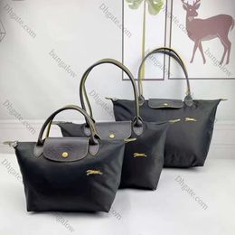 2024 Mens Luxo Tote Nylon Bolsas De Ombro Mulheres Bolsa Cruz Corpo Verão Designer Canvas Bolsa Bolinho De Couro Mini Pochette Bolsas Embreagem Saco De Compras