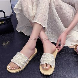 Slippers imitation straw plaited flat-heeled sandals Spring and summer tourist beach wear one-word slippers goddess national styleH240306