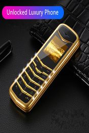 Unlocked Classical Design Signature 8800 Gold Mobile Phone Mini Metal Body Dual Sim Card GSM Quad Band MP3 Camera Cheap Cellphone 1034969