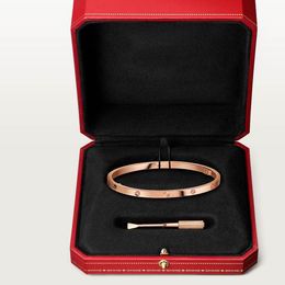 Designer popular screwdriver bracelet, fashionable and luxurious jewelry bracelet in 18K rose gold and silver diamonds. This bracelet features a unique "screw" design