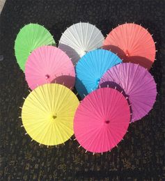 DHL 20304060cm Chinese Japanesepaper Parasol Paper Umbrella For Wedding Bridesmaids Party Favours Summer Sun Shade Kid Size8140949