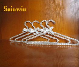 Sainwin 10pcslot 30cm20cm Children Pearl Baby Hangers For Kids Plastic Cloth Hanger Child Clothes Rack 2011111547004