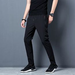 MenS Korean Fashion Casual Summer Thin Quick Drying Ice Silk Straight Pants Loose Sports 9Point Trousers Boy 240226