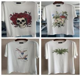 Mens tops designer shirt Men Women Flowers Print Black Blue TShirt Hip Hop Casual Luxury Clothing Cartoon Letter Skull Pattern St3733258