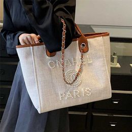 70% Factory Outlet Off Large capacity canvas tote bag for women's summer pearl niche texture underarm on sale