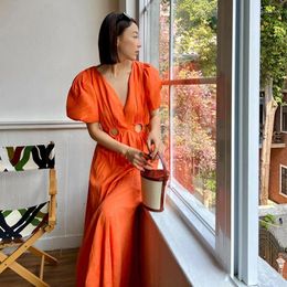 Casual Dresses Vacation Style Orange Bubble Sleeved Dress For Women In The Summer Of 2024 With A Simple And Cut Out Waist Sexy Long