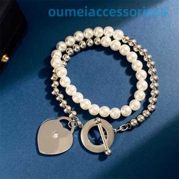 2024 Jewellery Designer Brand Necklaces Titanium Studded Diamond Heart Shaped Pendant Layer Pearl Silver Beads Buckle Bracelet and Fashionable