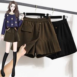 Large size autumn and winter new fat sister wool irregular pleated half length trouser skirt high waist thin short skirt A-line skirt