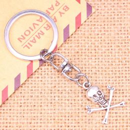 Keychains 20pcs Fashion Keychain 24x19mm Skull Skeleton Bone Pendants DIY Men Jewellery Car Key Chain Ring Holder Souvenir For Gift