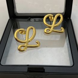 Designer's gold geometric earrings exaggerate niche design with a sense of luxury and light luxury French style earrings 2024 new earrings