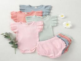 Kız bebek tasarımları giyim setleri bebek kızlar kısa kollu üst üst kısımlar şort katı iplik tulumlar fırfırlar çocuk kıyafetleri giyim seti 2314652