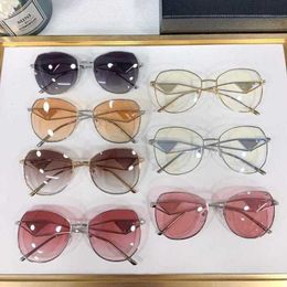 2024 Luxury Designer New luxury designer P family's new inverted triangle 57 Y the same polygonal UV resistant hollow out mirror leg sunglasses