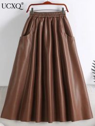 skirt UCXQ Korean Chic Solid Color PU Leather Skirts Mid Length Large Swing Half Skirt With Pockets Women 2024 Spring Autumn 23A7118