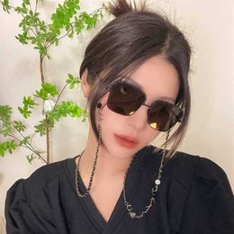 2024 Luxury Designer New luxury designer Chain box for women in new internet celebrity street photo same trend calfskin metal small fragrant sunglasses